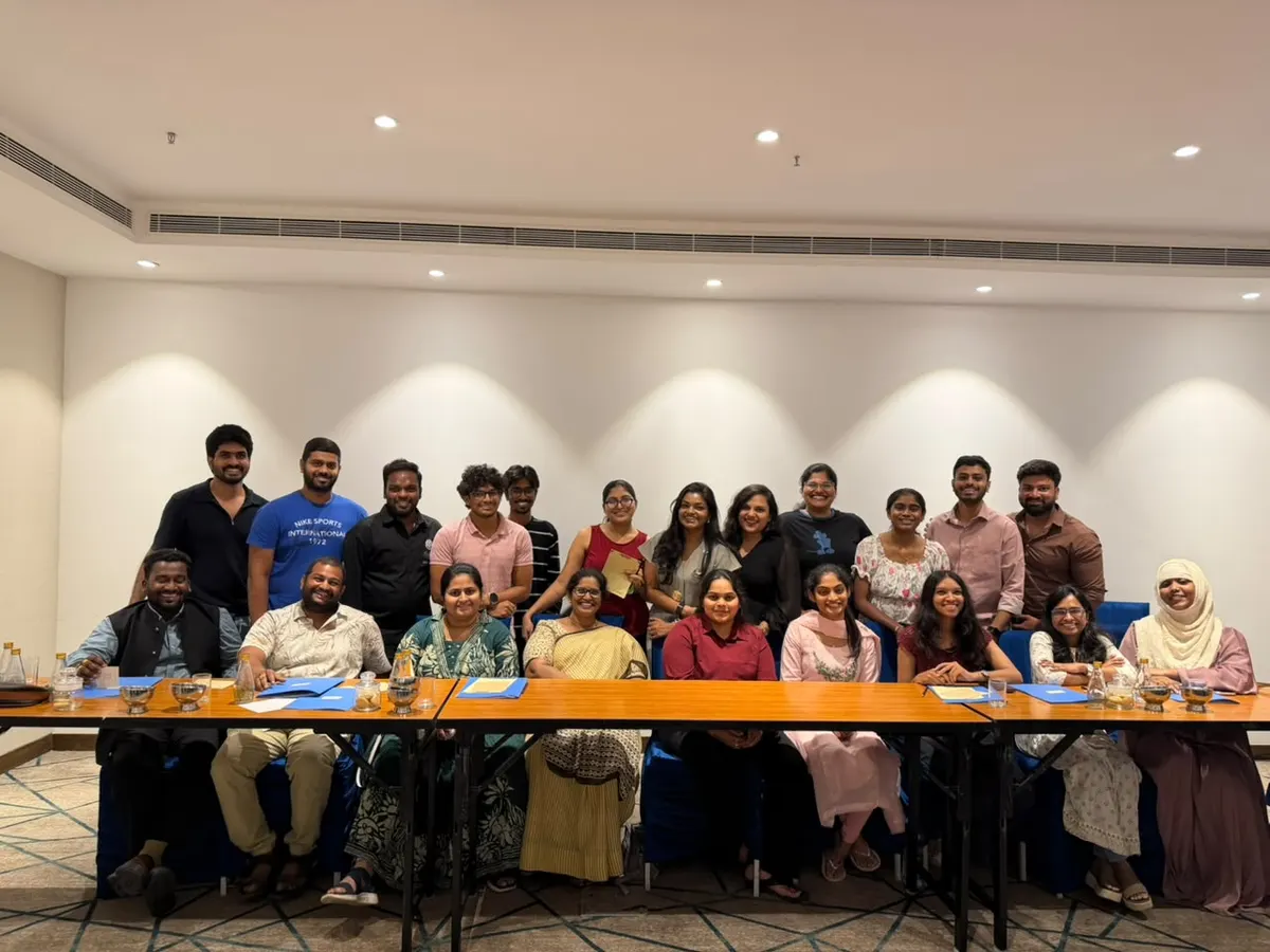 A group of organisers and attendees at a panel discussion